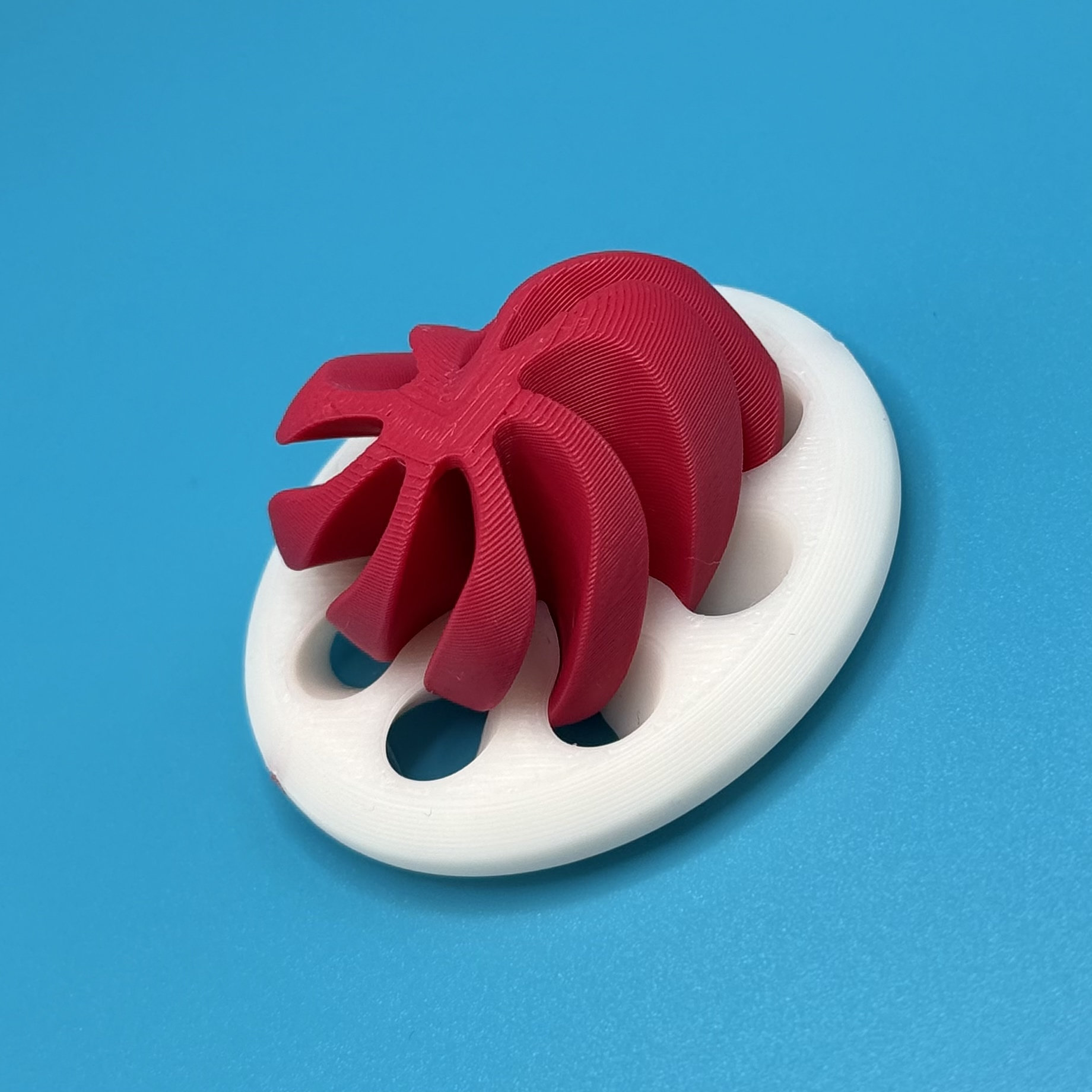 Red heart-style spinner