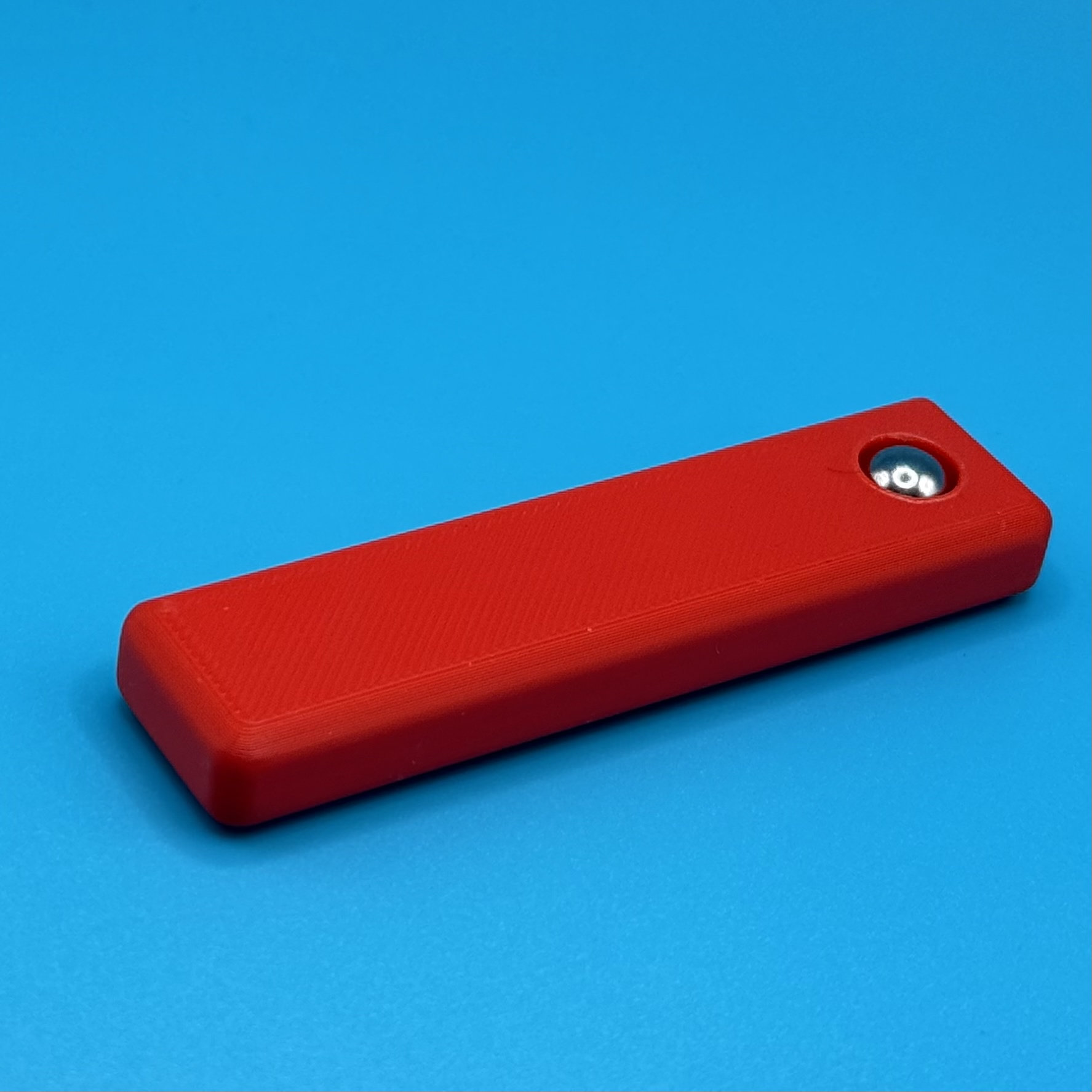 Red magnetic fidget bar