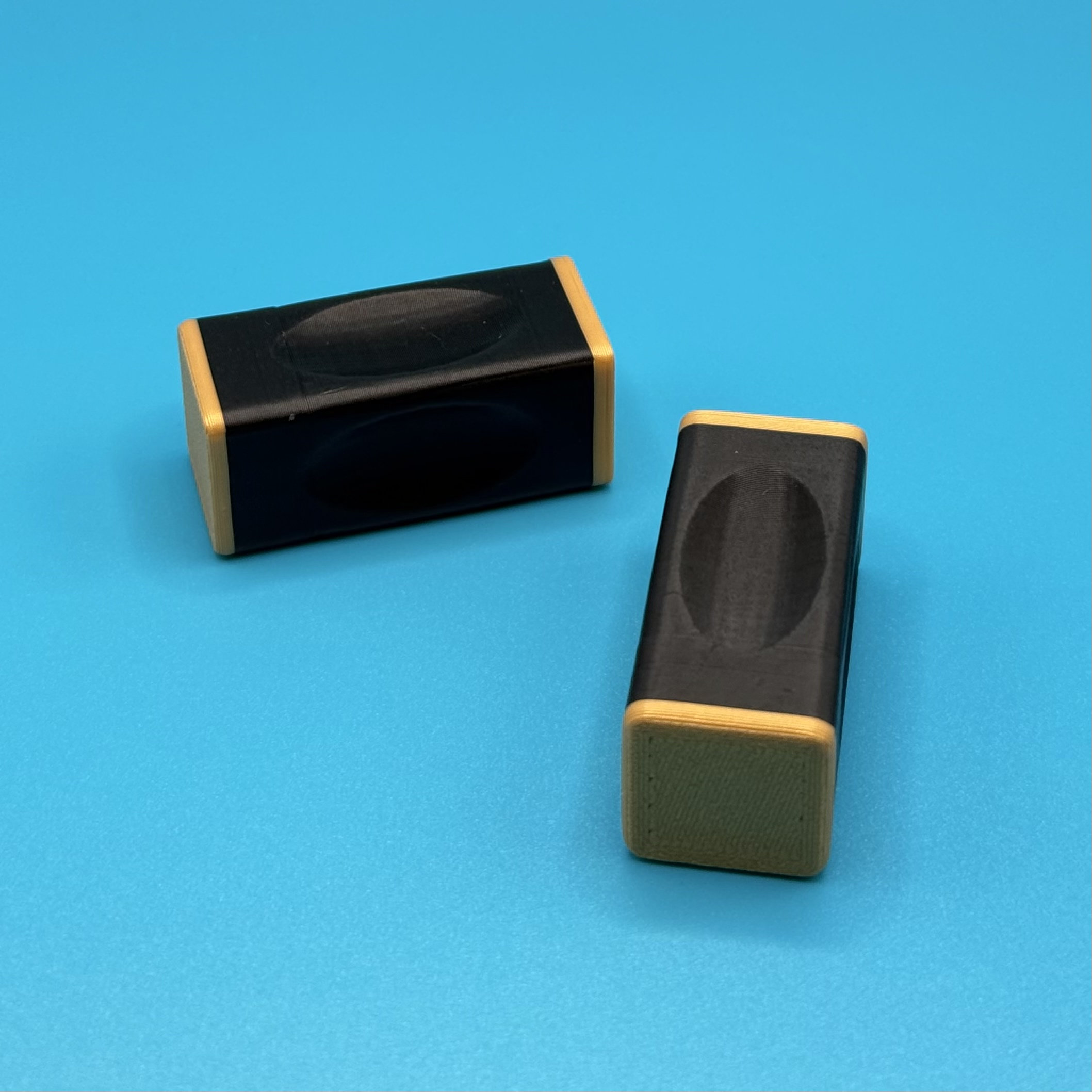 Gold-tipped black fidget bricks