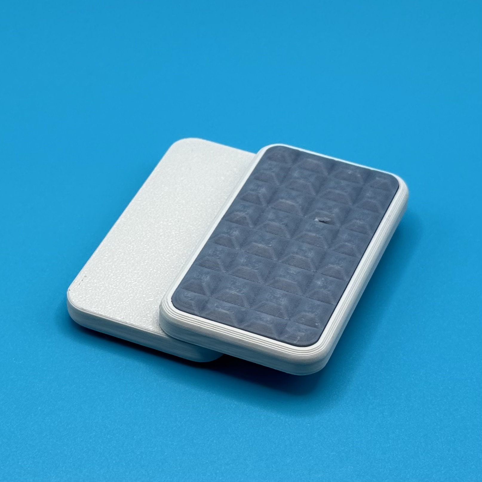 Slide-top tactile deck toy